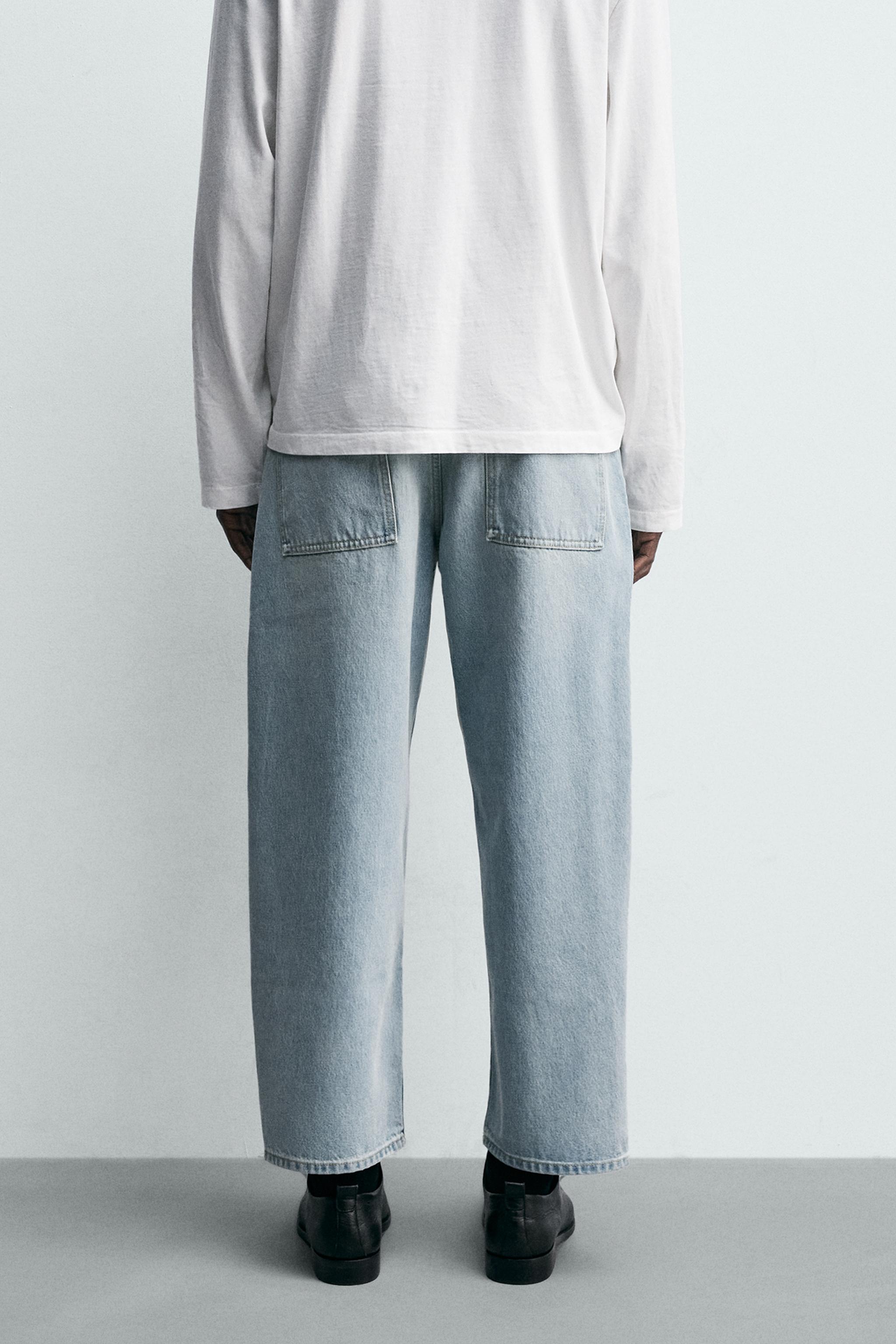 TAPERED WIDE FIT JEANS